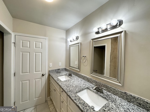 3191 Gay Dr, Decatur, GA 30032 - bathroom featuring double vanity, marble finish floor, and a sink