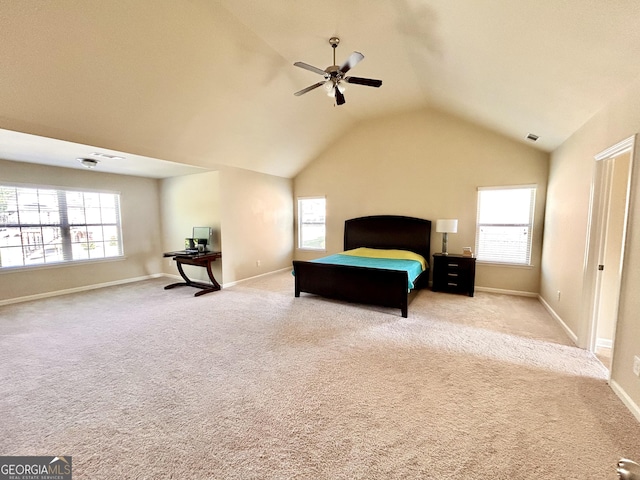 bedroom with visible vents, baseboards, multiple windows, and vaulted ceiling