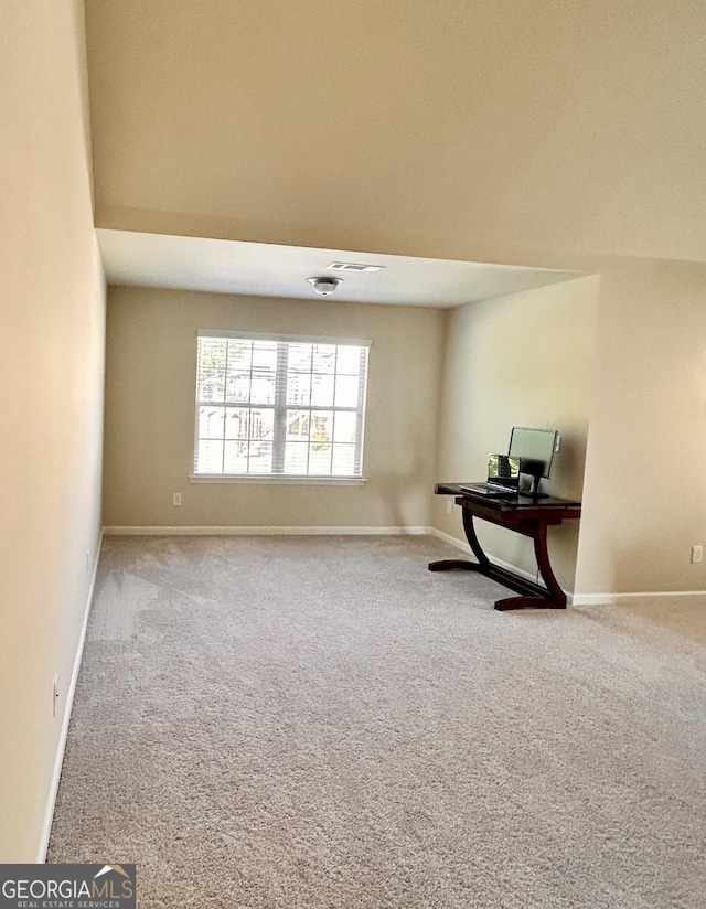 interior space featuring baseboards