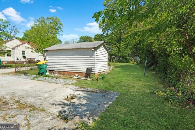 5024 Park Ave, Forest Park, GA 30297 - exterior space with an outdoor structure and a storage unit