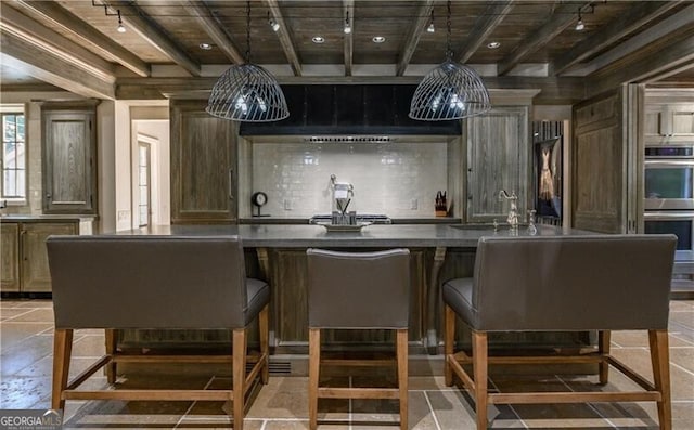 2979 Ridgewood Rd NW, Atlanta, GA 30327 - bar featuring a sink, wooden ceiling, track lighting, double oven, and beamed ceiling
