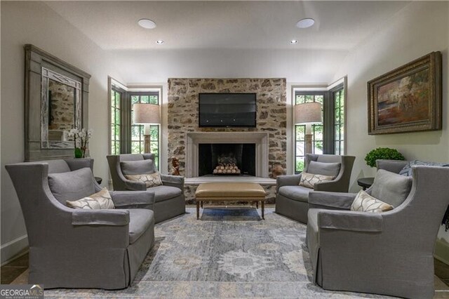 2979 Ridgewood Rd NW, Atlanta, GA 30327 - living room with a fireplace with raised hearth and recessed lighting