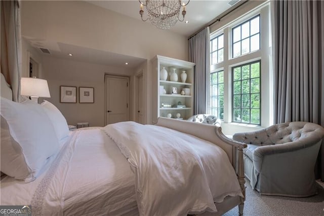 2979 Ridgewood Rd NW, Atlanta, GA 30327 - bedroom with a chandelier and a high ceiling