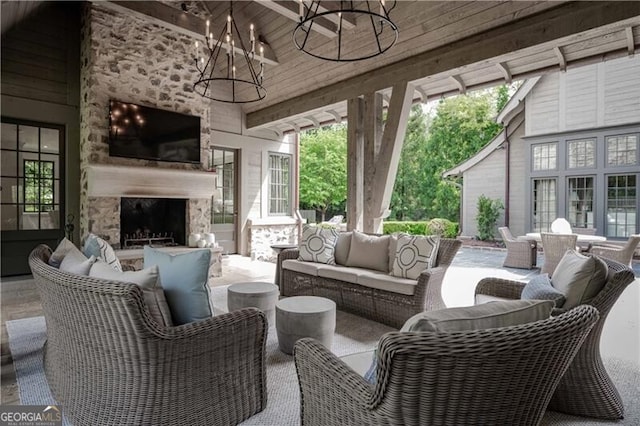 2979 Ridgewood Rd NW, Atlanta, GA 30327 - view of patio with an outdoor living space with a fireplace