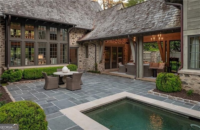 2979 Ridgewood Rd NW, Atlanta, GA 30327 - view of patio / terrace with french doors, an outdoor hangout area, and an outdoor pool