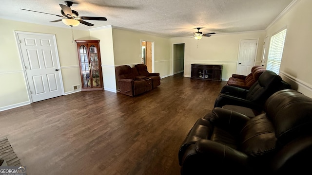 1093 Grace St SW, Mableton, GA 30126 - living room featuring a textured ceiling, dark wood-style flooring, a ceiling fan, and visible vents