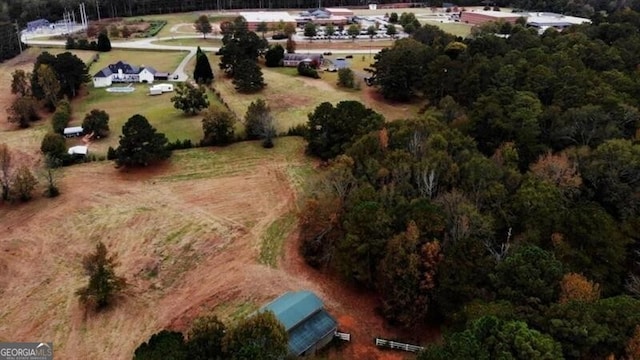 bird's eye view featuring a forest view