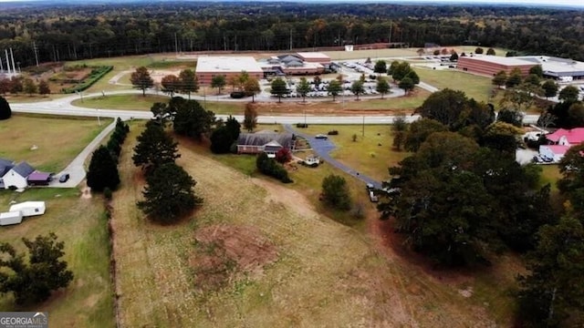 drone / aerial view with a forest view