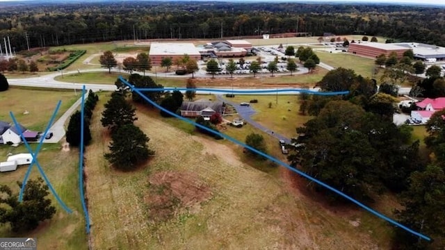 aerial view featuring a view of trees