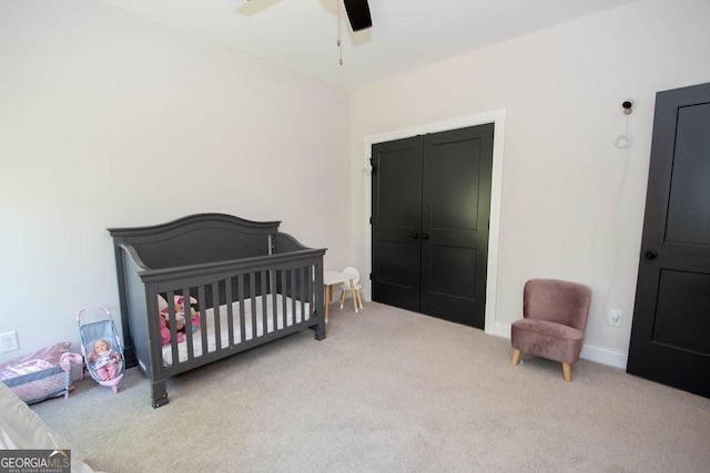 bedroom with carpet, baseboards, and ceiling fan
