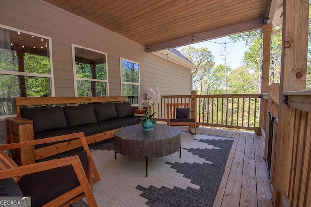 deck featuring outdoor lounge area