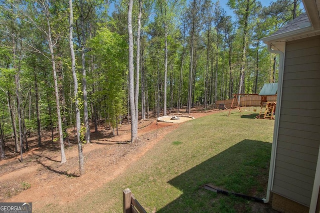 view of yard featuring a playground