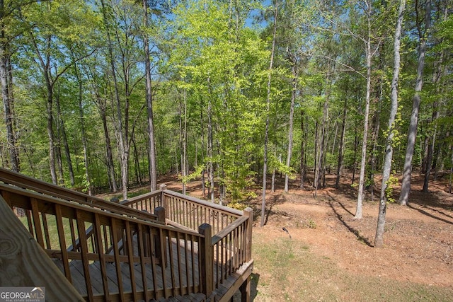 exterior space featuring a view of trees