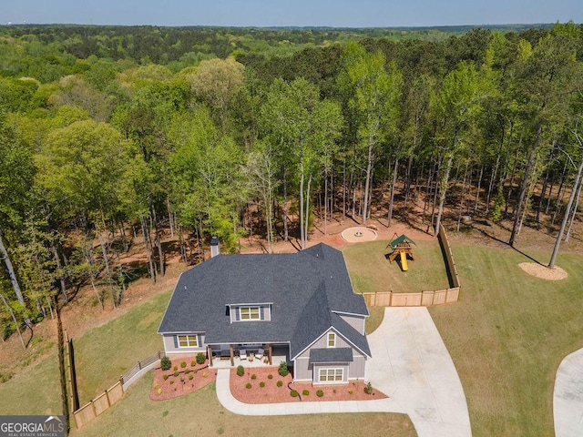 drone / aerial view with a forest view