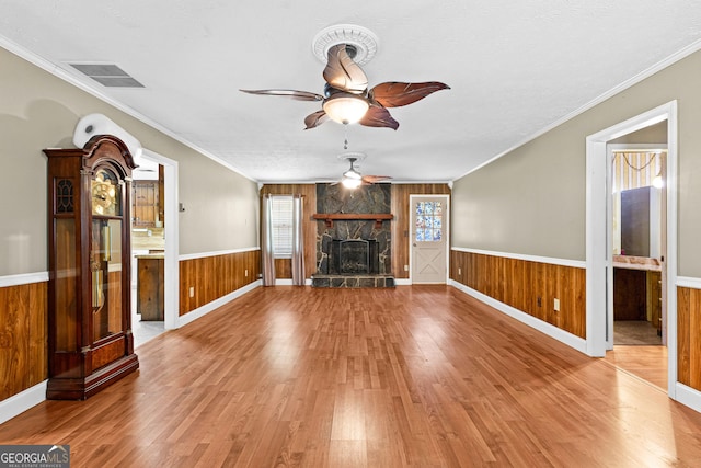324 County Line Rd, Fayetteville, GA 30215 - unfurnished living room featuring visible vents, a ceiling fan, wood finished floors, and a wainscoted wall