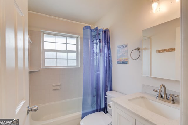 full bathroom featuring vanity, shower / bathtub combination with curtain, and toilet