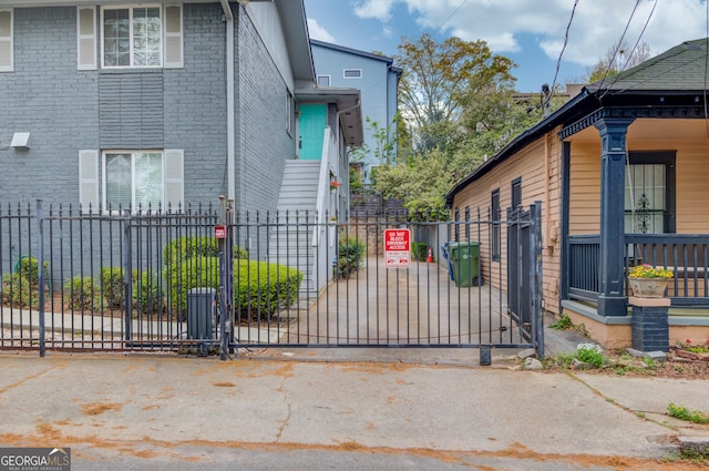 view of gate with fence private yard