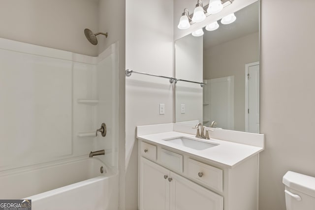 full bath with toilet, vanity, and washtub / shower combination