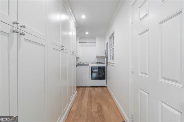 1305 Old Woodbine Rd, Atlanta, GA 30319 - hall with light wood-style flooring, baseboards, washing machine and dryer, and recessed lighting