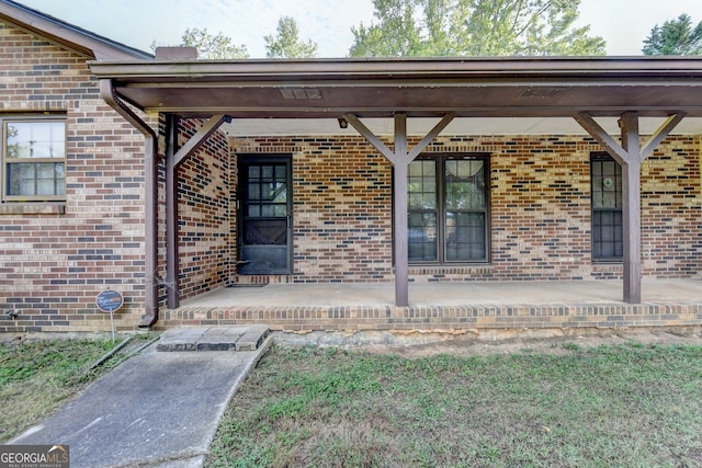 5680 Abbotts Bridge Rd, Johns Creek, GA 30097 - view of exterior entry with brick siding