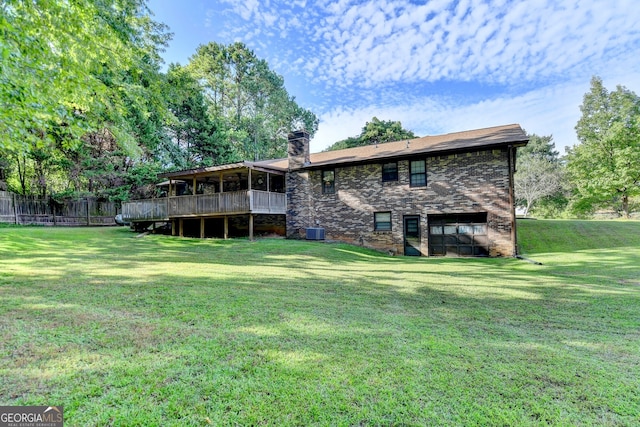 5680 Abbotts Bridge Rd, Johns Creek, GA 30097 - rear view of house featuring central air condition unit, a chimney, brick siding, and a lawn