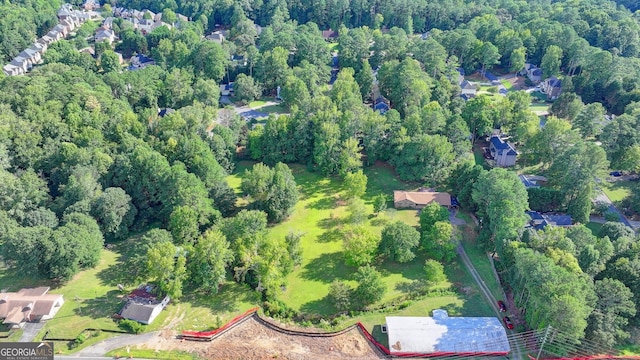 5680 Abbotts Bridge Rd, Johns Creek, GA 30097 - drone / aerial view with a wooded view