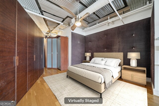 120 Ralph Mcgill Blvd NE Unit 1304 & 1305, Atlanta, GA 30308 - bedroom featuring wood finished floors and a ceiling fan