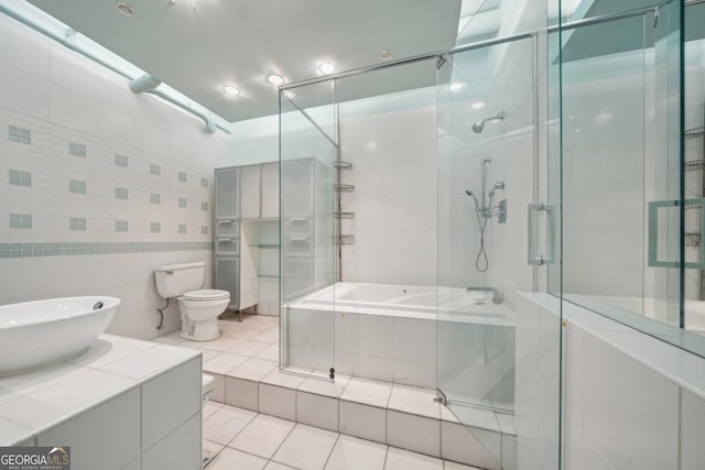120 Ralph Mcgill Blvd NE Unit 1304 & 1305, Atlanta, GA 30308 - bathroom featuring tile patterned floors, vanity, and tile walls