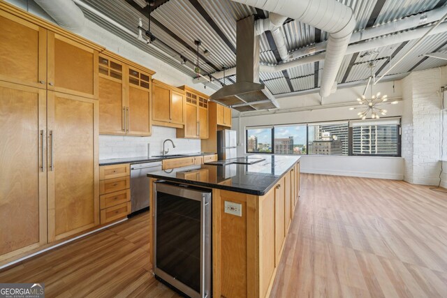 120 Ralph Mcgill Blvd NE Unit 1304 & 1305, Atlanta, GA 30308 - kitchen with beverage cooler, dishwasher, light wood-style flooring, freestanding refrigerator, and a kitchen island