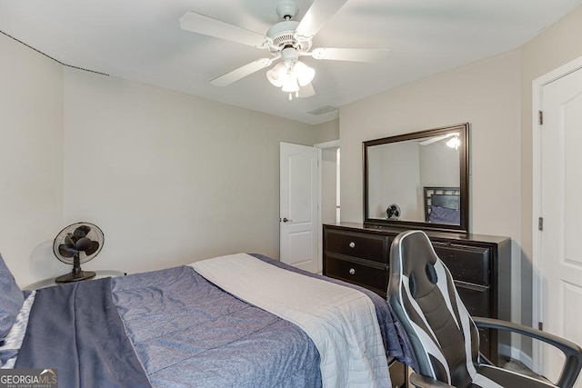 bedroom with visible vents and ceiling fan