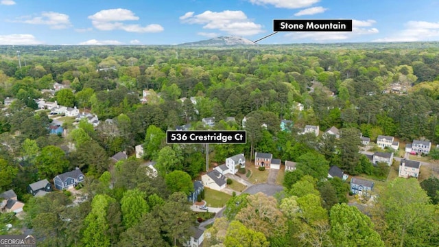 drone / aerial view with a forest view