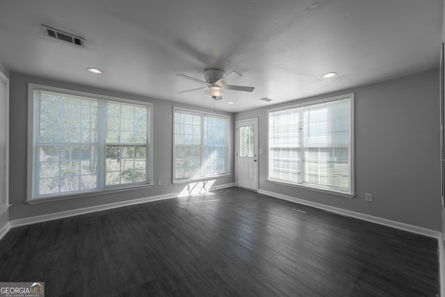 spare room with recessed lighting, visible vents, a ceiling fan, and baseboards