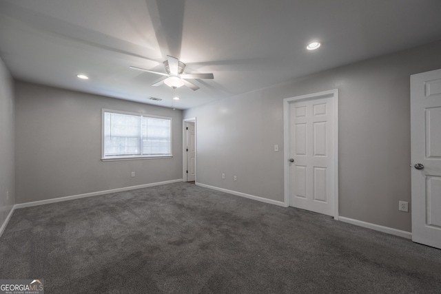 spare room with a ceiling fan, carpet, baseboards, visible vents, and recessed lighting