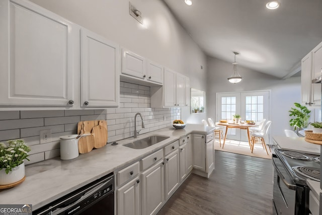 kitchen with dishwasher, white cabinets, range with electric cooktop, and a sink