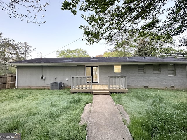 659 Country Club Rd, Newnan, GA 30263 - back of house featuring crawl space, brick siding, central AC unit, a wooden deck, and fence