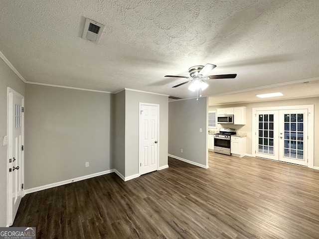 659 Country Club Rd, Newnan, GA 30263 - unfurnished living room with french doors, ceiling fan, dark wood finished floors, and visible vents