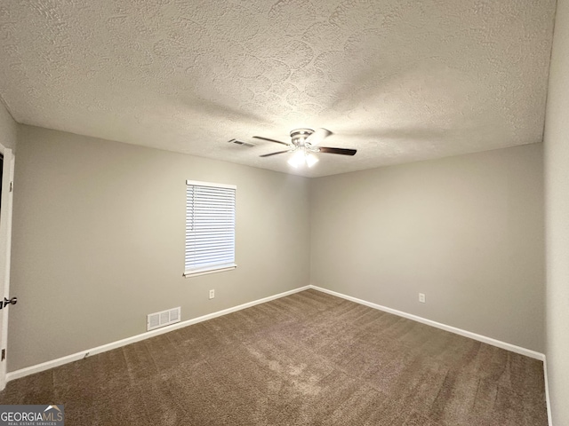 659 Country Club Rd, Newnan, GA 30263 - spare room featuring baseboards, a textured ceiling, visible vents, dark carpet, and ceiling fan