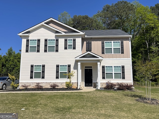 205 Sullivan St, Hampton, GA 30228 - craftsman house featuring board and batten siding and a front lawn