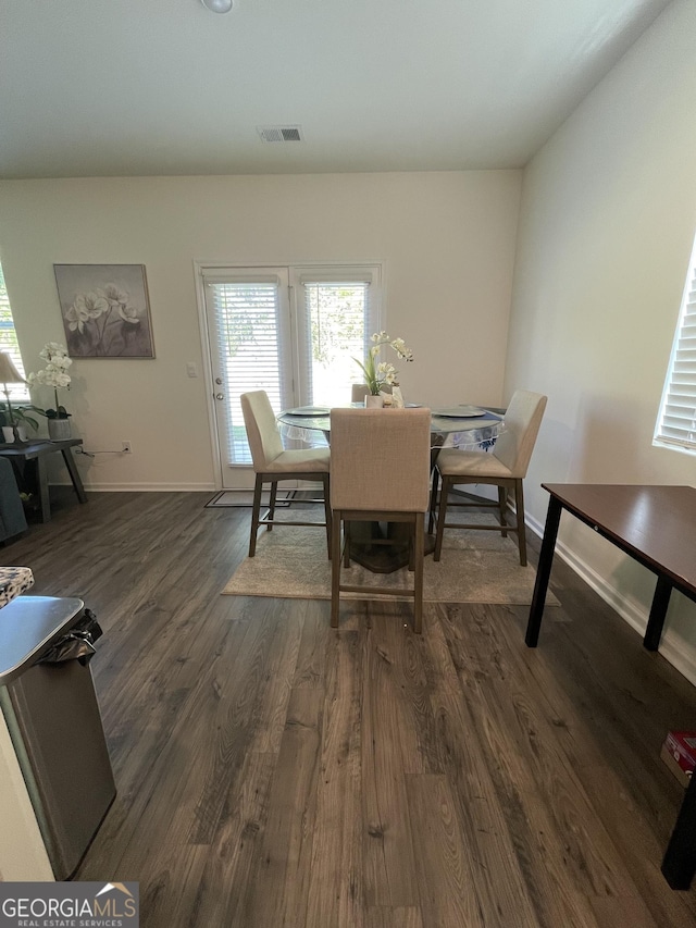 205 Sullivan St, Hampton, GA 30228 - dining room with dark wood-type flooring and plenty of natural light