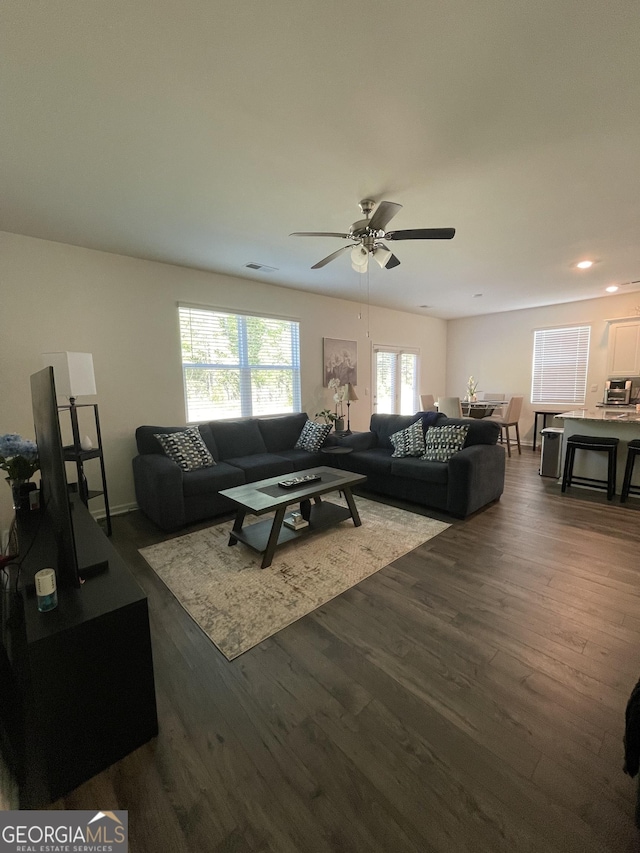 205 Sullivan St, Hampton, GA 30228 - living room with dark wood-style flooring, a ceiling fan, and recessed lighting