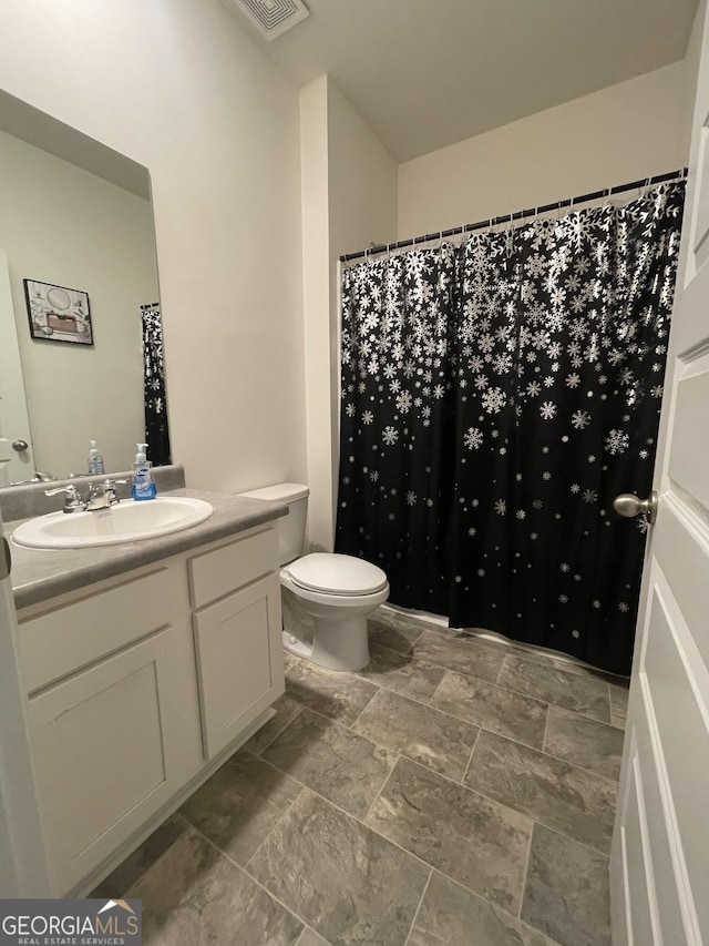 205 Sullivan St, Hampton, GA 30228 - full bathroom with vanity and stone finish flooring