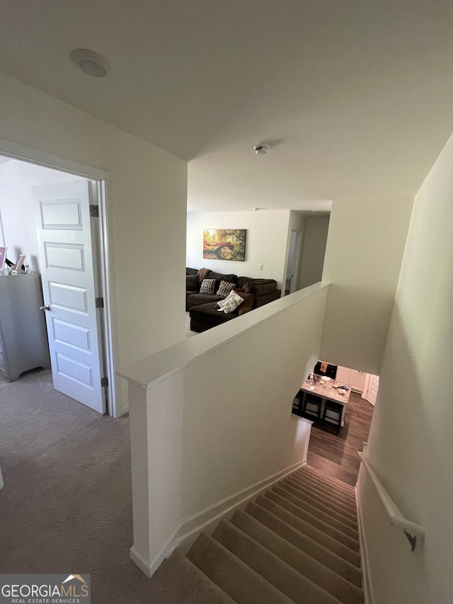 205 Sullivan St, Hampton, GA 30228 - staircase featuring carpet floors
