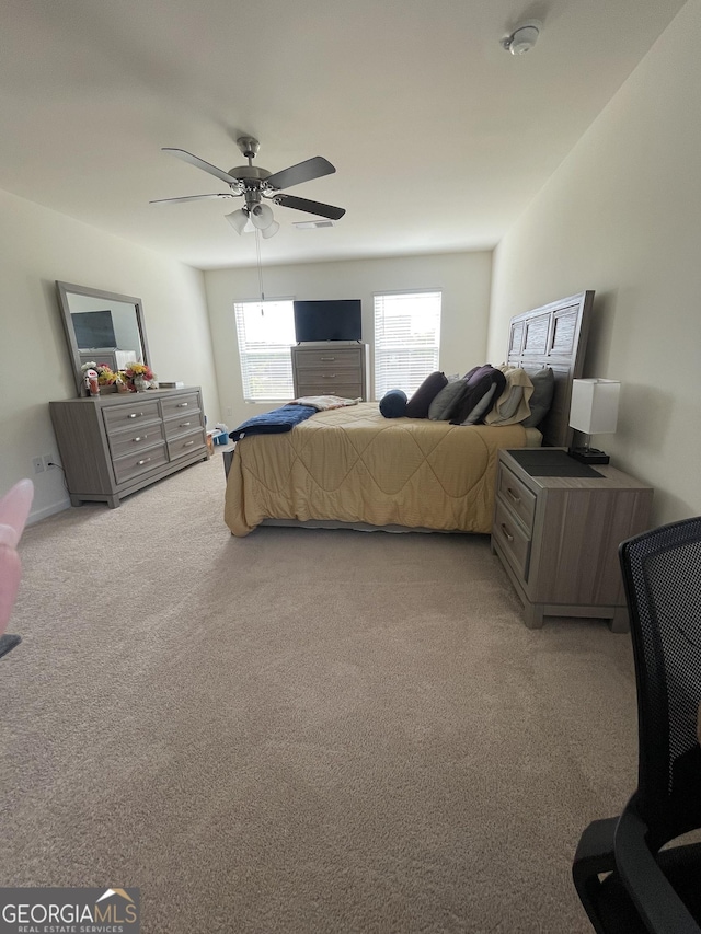 205 Sullivan St, Hampton, GA 30228 - bedroom featuring light carpet and a ceiling fan