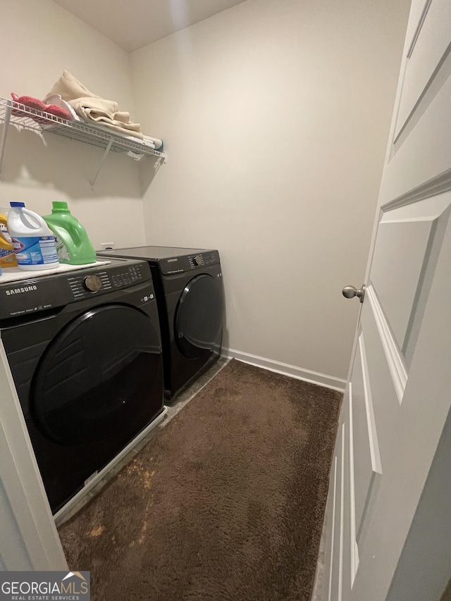 205 Sullivan St, Hampton, GA 30228 - laundry area featuring washer and clothes dryer and carpet floors