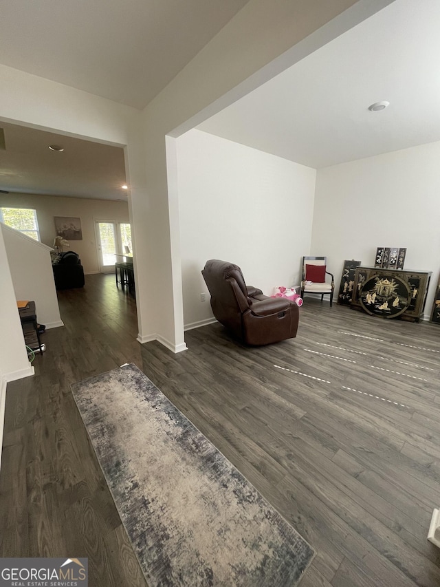 205 Sullivan St, Hampton, GA 30228 - living area with wood finished floors and baseboards