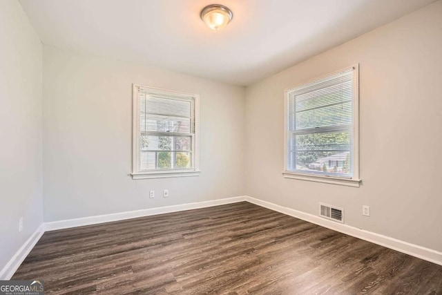 1105 S Parkwood Dr, Forest Park, GA 30297 - unfurnished room featuring baseboards, visible vents, and a wealth of natural light