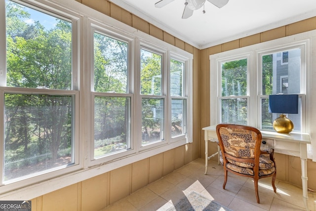 sunroom / solarium with tile patterned flooring and plenty of natural light