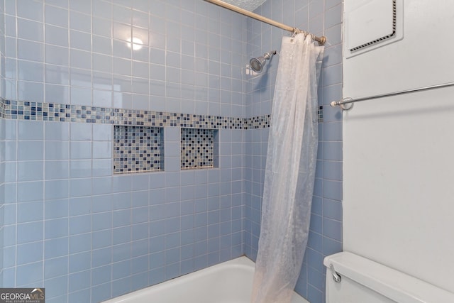 full bath featuring shower / bath combination with curtain and toilet