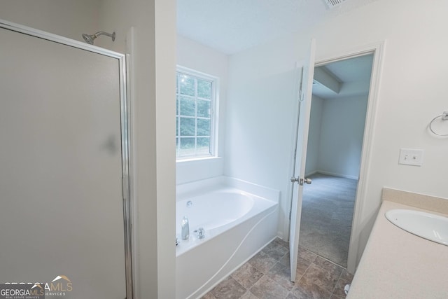 460 Mckneely Rd, Griffin, GA 30224 - bathroom with a bath, a stall shower, and vanity