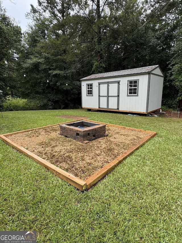 460 Mckneely Rd, Griffin, GA 30224 - view of shed with a fire pit